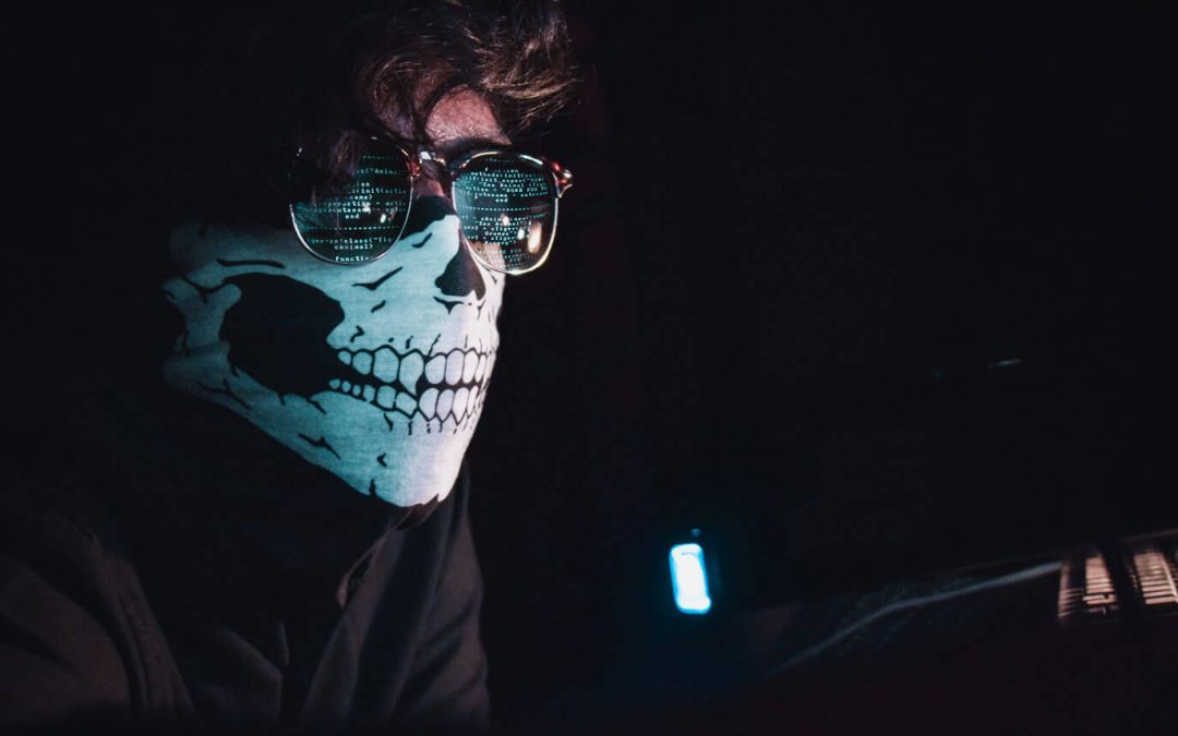 Computer Hacker with Mask